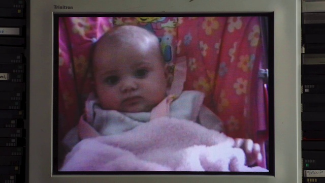 Video Reference: Cheek, Chin, Picture frame, Eyebrow, Mouth, Iris, Pink, Television set, Baby, Rectangle