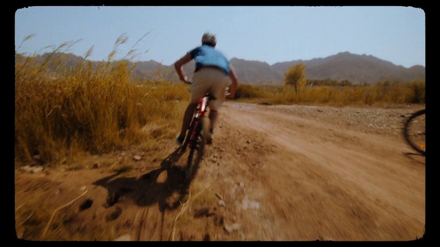 Video Reference: Bicycle, Wheel, Bicycles--Equipment and supplies, Tire, Sky, Helmet, Plant community, Bicycle frame, Ecoregion, Bicycle wheel