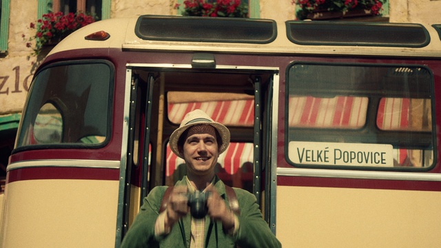 Video Reference: Vehicle, Motor vehicle, Green, Automotive exterior, Mode of transport, Headgear, Smile, Red, People, Travel