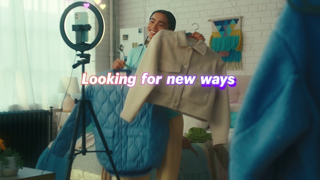 Video Reference: Blue, Font, Plant, Formal wear, Electric blue, Event, Fashion design, Advertising, Suit, Room