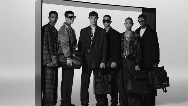 Video Reference: Coat, Sleeve, Standing, Style, Collar, Overcoat, Black-and-white, Fashion design, Blazer, Formal wear