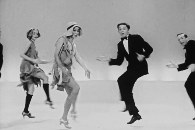 Video Reference: Gesture, Style, Black-and-white, Happy, Dance, Shorts, Performing arts, Entertainment, Fashion design, Fun