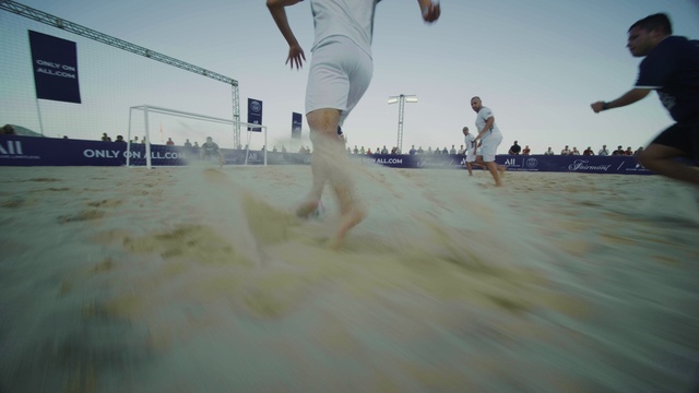 Video Reference: Sky, People on beach, Flash photography, Gesture, Sports equipment, Happy, People in nature, Landscape, Recreation, Human leg