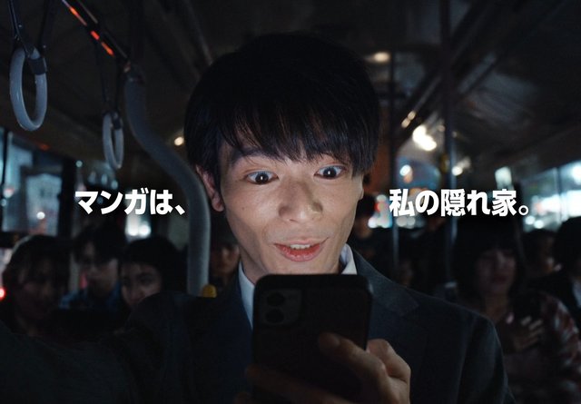 Video Reference: man, train, smartphone, selfie, portrait, suit, subway, interior, night, japanese text, ad frame, close-up, transportation, low light, reflection, crowd