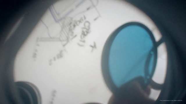 Video Reference: Font, Material property, Circle, Goggles, Helmet, Electric blue, Personal protective equipment, Sports equipment, Auto part, Eyewear