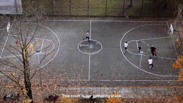 Video Reference: Asphalt, Automotive tire, Font, Wheel, Road surface, Grass, Circle, Space, Sidewalk, City