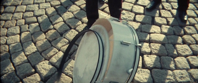 Video Reference: Membranophone, Drum, Musical instrument, Drumhead, Wood, Automotive tire, Musician, Idiophone, Wall, Tints and shades