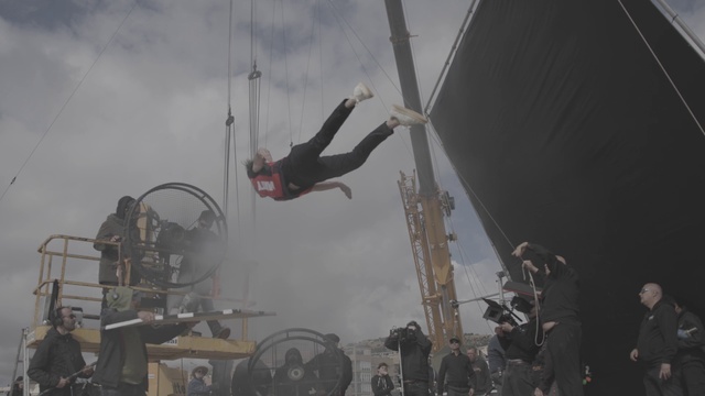 Video Reference: Cloud, Sky, Aerialist, Entertainment, Stunt performer, Performing arts, Event, Trapeze, Stunt, Balance