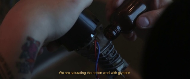 Video Reference: Flash photography, Audio equipment, Nail, Wrist, Thumb, Human leg, Cameras & optics, Auto part, Electric blue, Elbow