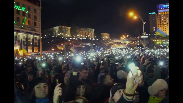 Video Reference: Building, Light, Window, Public space, Crowd, Sky, City, Metropolitan area, Entertainment, Fun