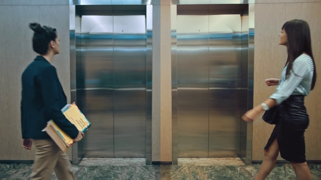 Video Reference: Photograph, White, Black, Human, Street fashion, Standing, Bag, Architecture, Yellow, Luggage and bags