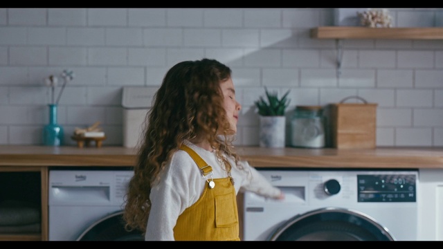 Video Reference: Clothes dryer, Washing machine, Cabinetry, Kitchen, Countertop, Plant, Kitchen appliance, Home appliance, Laundry, Happy