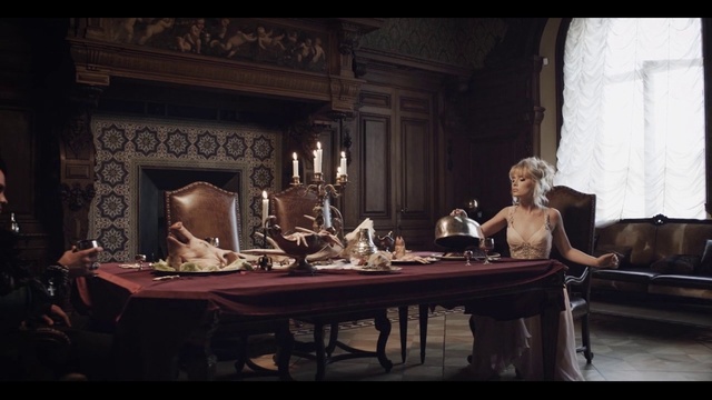 Video Reference: Table, Picture frame, Chair, Lighting, Tableware, Entertainment, Performing arts, Flash photography, Desk, Candle