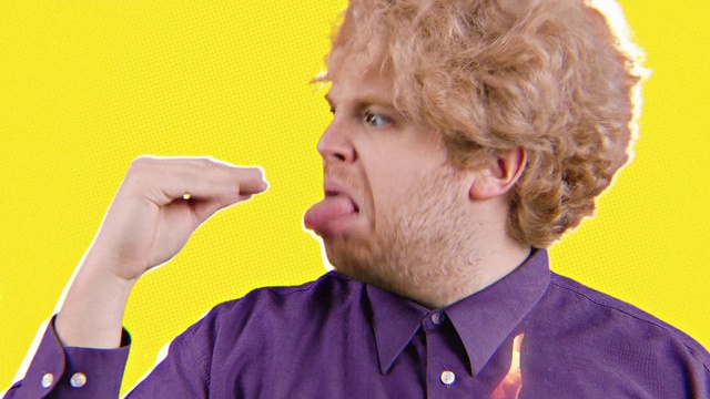 Video Reference: Forehead, Face, Chin, Shirt, Gesture, Dress shirt, Collar, Spokesperson, Audio equipment, Event