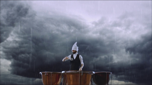 Video Reference: Cloud, Membranophone, Sky, Flash photography, Musical instrument, Musician, Cumulus, Landscape, Event, Smoke