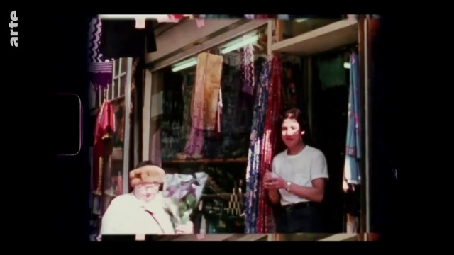 Video Reference: Shirt, T-shirt, Entertainment, Magenta, Musical instrument, Fun, Display device, Event, Music, Font