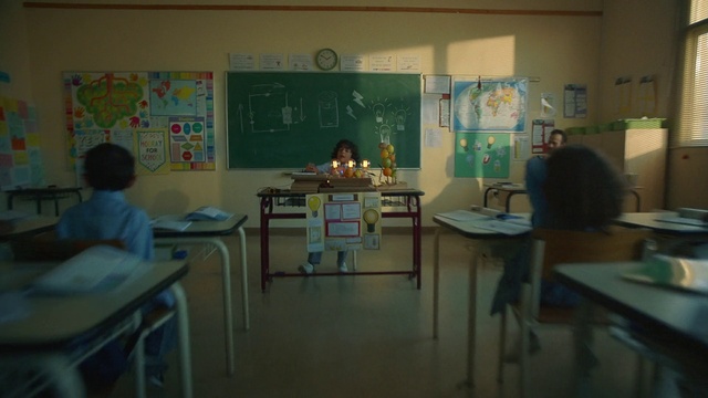 Video Reference: Table, Furniture, Building, Academic institution, Event, Desk, Room, Class, Education, Visual arts