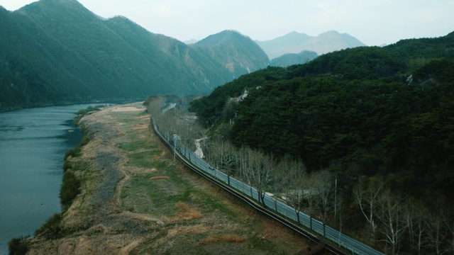 Video Reference: Mountain, Sky, Water, Slope, Natural landscape, Thoroughfare, Plant, Landscape, Mountain range, Valley