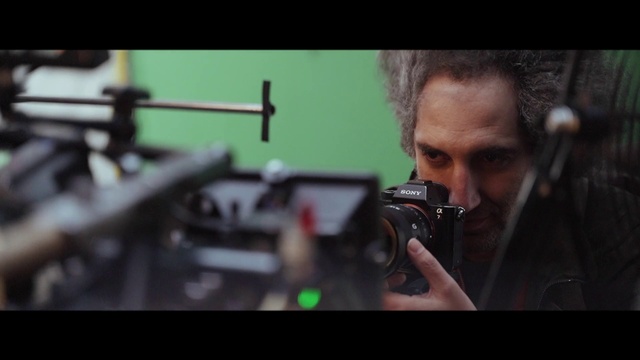 Video Reference: Flash photography, Music artist, Cameras & optics, Electronic device, Entertainment, Cinematographer, Audio equipment, Engineering, Shooting, Journalist