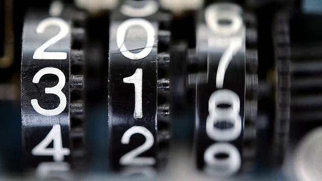 Video Reference: Office equipment, Font, Material property, Audio equipment, Automotive tire, Camera accessory, Close-up, Circle, Number, Monochrome