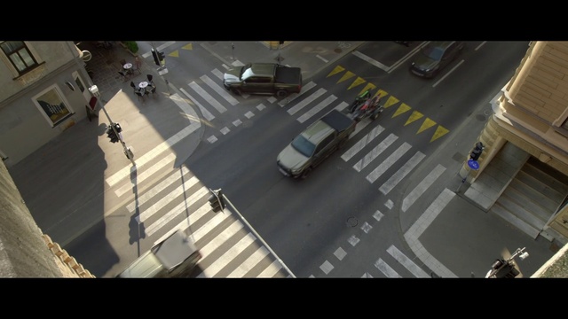 Video Reference: Road surface, Zebra crossing, Asphalt, Urban design, Vehicle, Pedestrian crossing, Road, City, Car, Symmetry