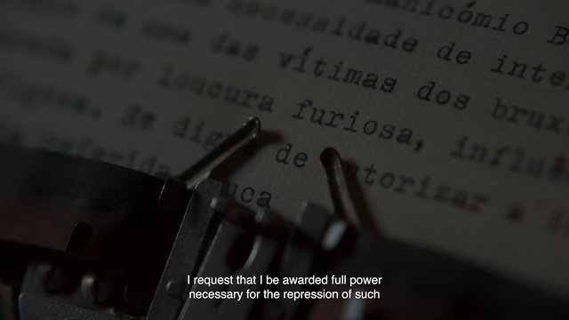 Video Reference: typewriter, typed text, close-up, document, subtitles, mechanical, office, writing, paper, macro, low light, historical, editing, text, translation, film still