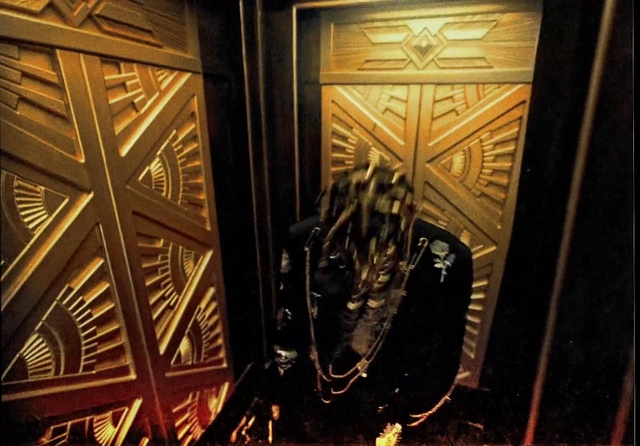 Video Reference: Gold, Wood, Symmetry, Tints and shades, Pattern, Metal, Automotive tire, Door, Glass, Darkness