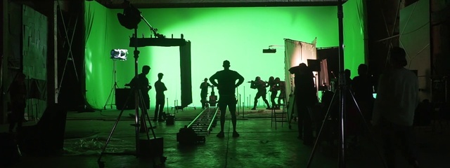 Video Reference: Green, Film studio, Human, Entertainment, Standing, Musician, Performing arts, Music, Tripod, Stage