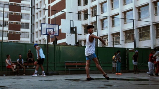 Video Reference: Basketball, Shorts, Basketball hoop, Streetball, Sports equipment, Window, Player, Building, Basketball court, Ball game
