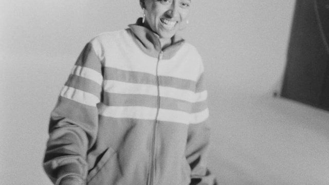 Video Reference: Beard, Sleeve, Gesture, Grey, Black-and-white, Style, Flash photography, Elbow, Happy, T-shirt