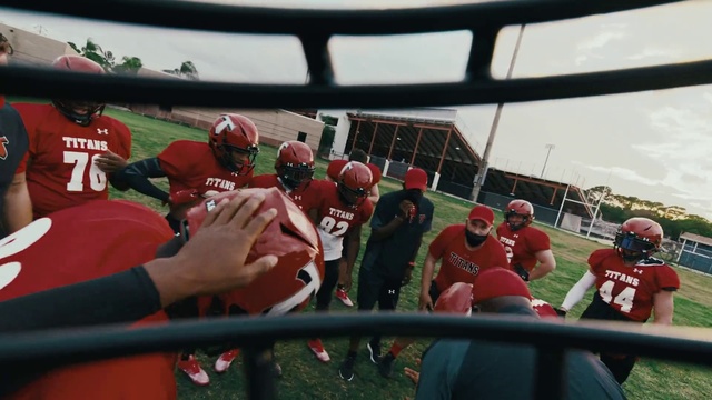 Video Reference: Sports gear, Sports uniform, Helmet, Football equipment, Football helmet, Jersey, Shorts, Player, Sports equipment, Sports jersey