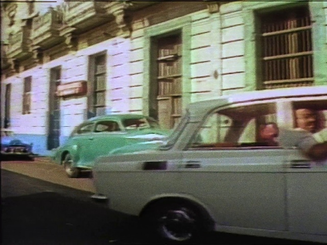 Video Reference: Car, Wheel, Tire, Land vehicle, Vehicle, Photograph, Window, Building, Motor vehicle, Hood