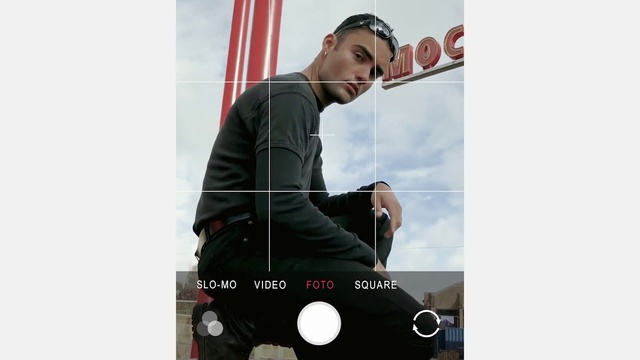 Video Reference: Shirt, Sleeve, T-shirt, Font, Street fashion, Travel, Workwear, Flag, Advertising, Sitting