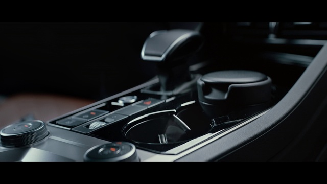 Video Reference: Gear shift, Hood, Vehicle, Motor vehicle, Personal luxury car, Automotive design, Carbon, Vehicle door, Automotive mirror, Center console