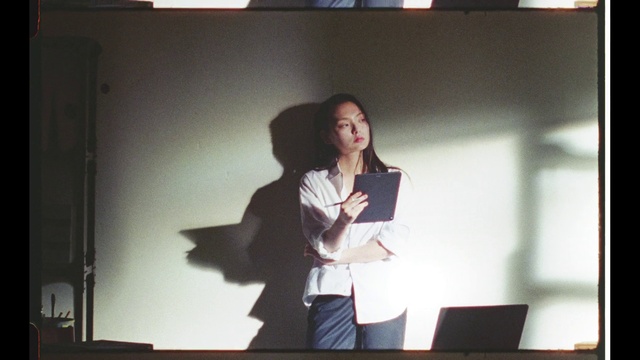 Video Reference: Coat, Standing, Gesture, Blazer, Microphone, Fun, Event, White-collar worker, Entertainment, Display device