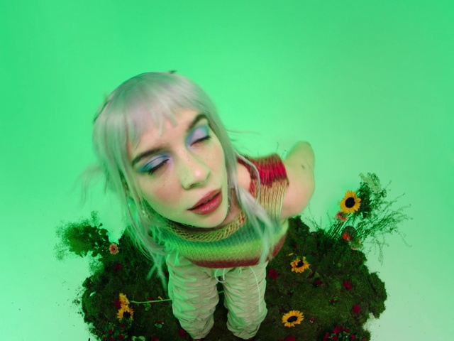 Video Reference: Green, People in nature, Happy, Eyelash, Flash photography, Grass, Fun, Brown hair, Flower, Petal