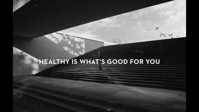 Video Reference: black and white, architecture, stairs, outdoor, modern building, person, birds, sky, wide shot, minimalist, text overlay, urban, contemporary, monochrome, advertisement, landscape