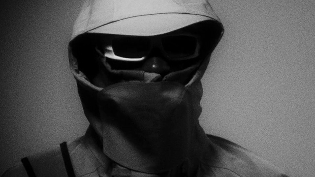 Video Reference: Neck, Jaw, Vision care, Sleeve, Flash photography, Gesture, Grey, Eyewear, Beard, Headgear