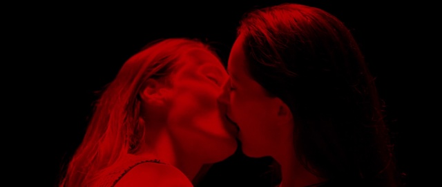 Video Reference: Lip, Kiss, Flash photography, Gesture, Entertainment, Performing arts, Magenta, Font, Event, Romance