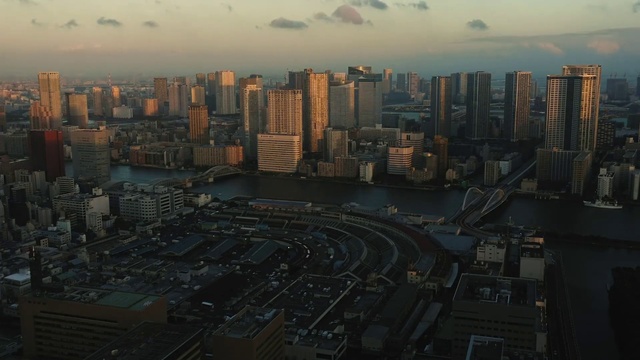 Video Reference: Cloud, Sky, Building, Skyscraper, Water, Atmosphere, Daytime, Nature, Tower, Dusk
