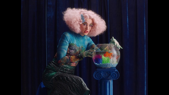 Video Reference: Entertainment, Performing arts, Curtain, Artist, Event, Fun, Fashion design, Art, Electric blue, Child