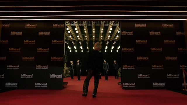 Video Reference: Font, Flooring, Stage, Event, Stage equipment, Red carpet, Carpet, Symmetry, Rectangle, Darkness