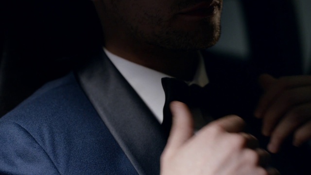 Video Reference: Hand, Dress shirt, Flash photography, Sleeve, Gesture, Beard, Collar, Grey, Finger, Elbow