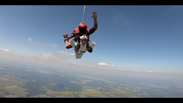 Video Reference: Tandem skydiving, Sky, Cloud, Atmosphere, Helmet, Nature, Paragliding, Parachuting, Parachute, Stunt performer