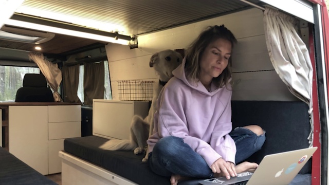 Video Reference: Computer, Laptop, Comfort, Personal computer, Air travel, Drawer, Curtain, Television, White-collar worker, Luxury vehicle