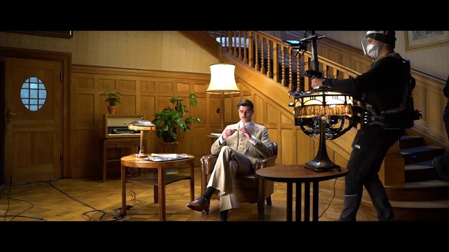 Video Reference: Table, Furniture, Human, Interior design, Houseplant, Lamp, Plant, Window, Entertainment, Event