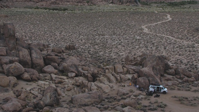 Video Reference: Bedrock, Vehicle, Landscape, Car, Tire, Geological phenomenon, Automotive tire, Motor vehicle, Wheel, Grass