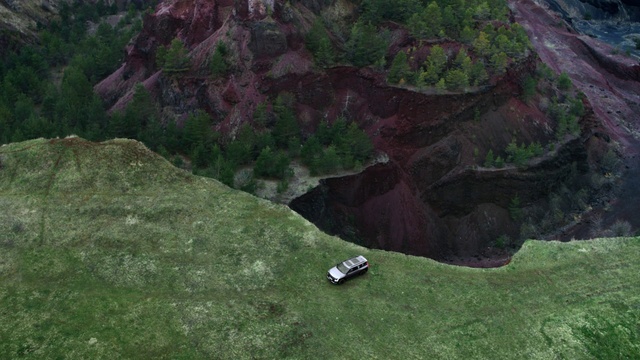 Video Reference: Highland, Mountain, Bedrock, Natural landscape, Grass, Terrain, Mountainous landforms, Grassland, Landscape, Plant