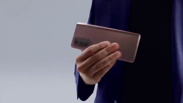 Video Reference: Sleeve, Gesture, Collar, Gadget, Blazer, Thumb, Nail, Formal wear, Electric blue, Dress shirt