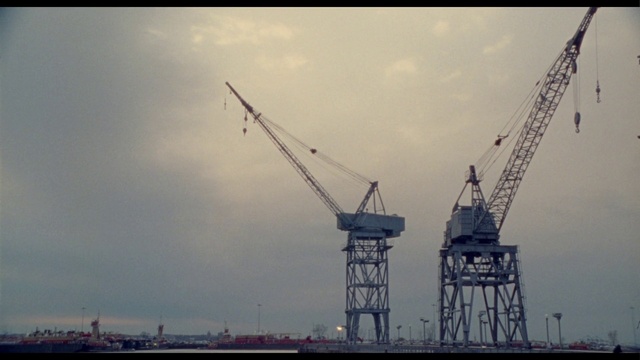 Video Reference: Sky, Cloud, Atmospheric phenomenon, Morning, Crane, Tower, Composite material, Machine, Horizon, Public utility